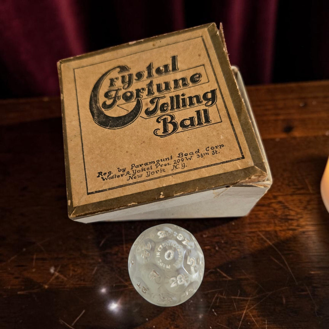 Antique 1930s Crystal Fortune Telling Ball by Paramount Bead Corp beside its original box — order a personal fortune reading delivered by email