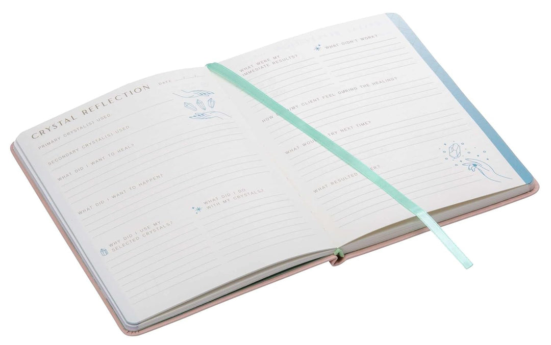 Crystal Healing Reflection Journal interior showing chakra sections with crystal properties and guided prompts