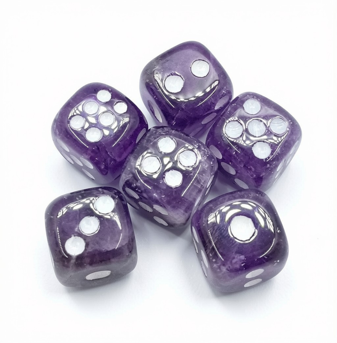 Five natural amethyst crystal D6 dice with white pips arranged in a fan on a white background, showing translucent purple gemstone detail