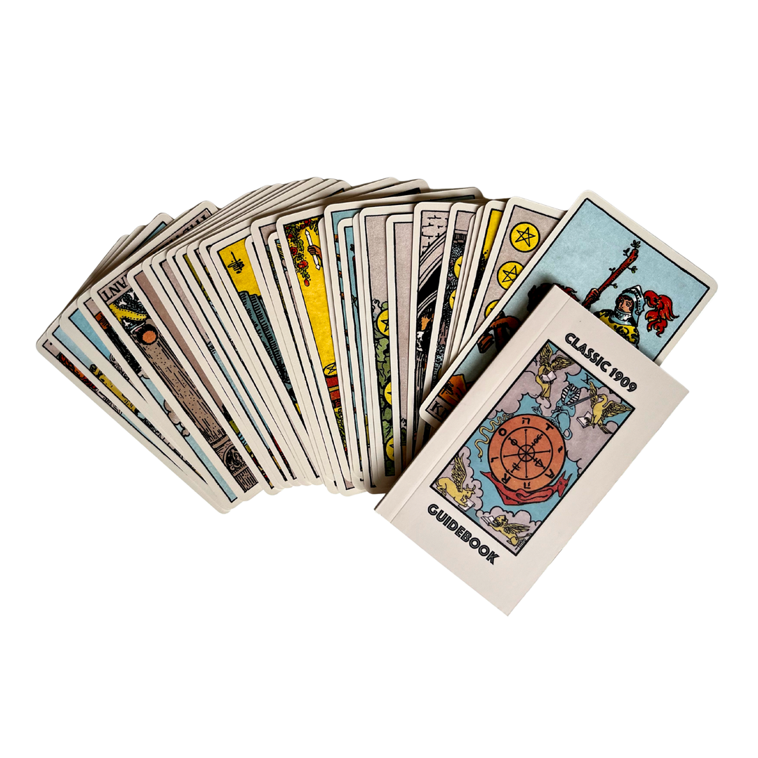 Classic 1909 Rider-Waite Tarot Deck fanned out with included Classic 1909 Guidebook on white background