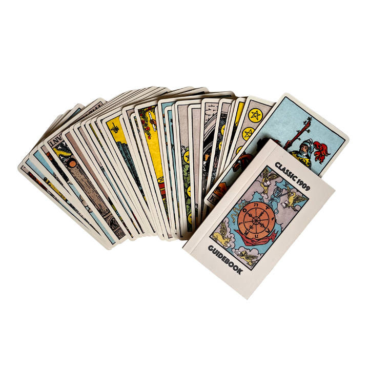 Classic 1909 Rider-Waite Tarot Deck fanned out with included Classic 1909 Guidebook on white background