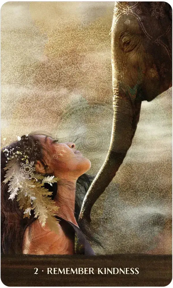 Detailed view of Wild Woman Rising oracle card artwork celebrating feminine power and wild nature. Woman with elephant.