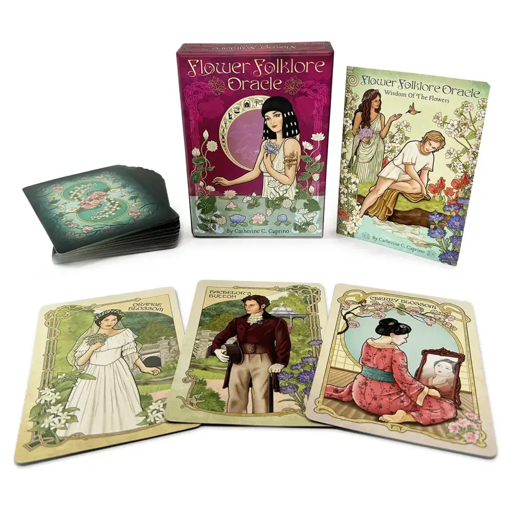 Flower Folklore Oracle 44 cards fanned showing Art Nouveau botanical card backs with teal floral border design, box, and guidebook