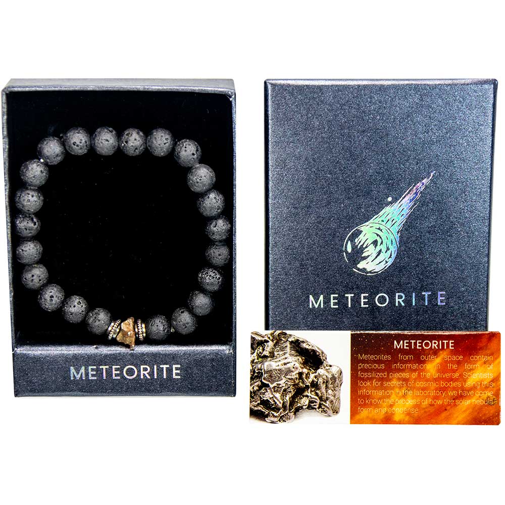 Genuine meteorite lava stone bracelet in open gift box with meteorite gift box lid raw meteorite fragment and informational card