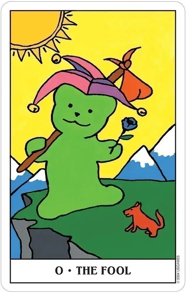 The Fool card from Gummy Bear Tarot, showing a green bear with a flower and travel bundle beside a small dog near a cliff.