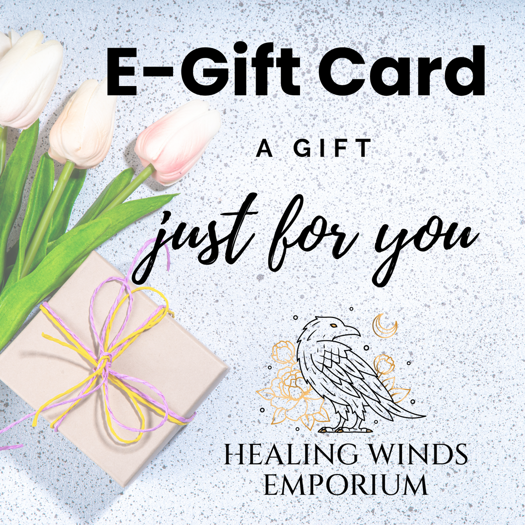 Healing Winds Emporium e-gift card — "A Gift Just For You" with wrapped present and tulips, featuring the Healing Winds Emporium raven logo