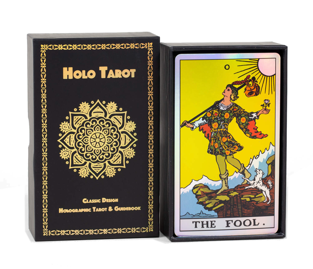 Holo Tarot holographic Rider-Waite tarot deck in black foiled box with The Fool card displayed, by Vieux Monde
