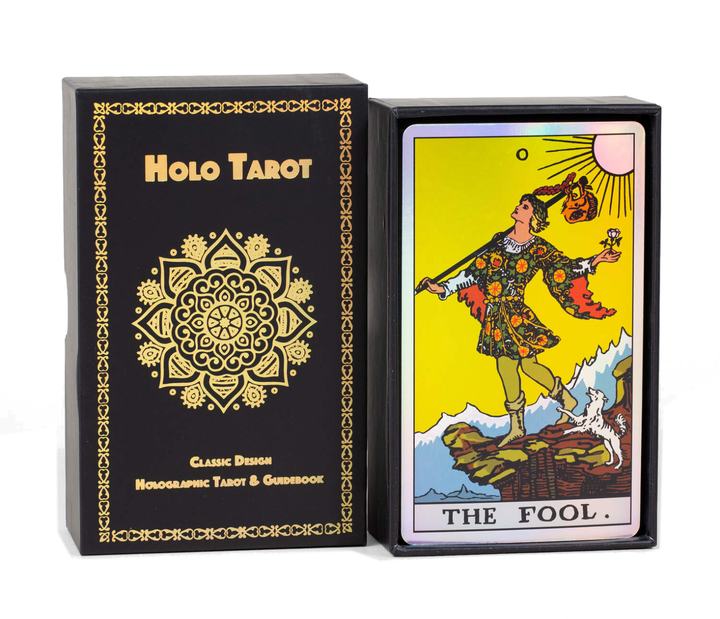 Holo Tarot holographic Rider-Waite tarot deck in black foiled box with The Fool card displayed, by Vieux Monde
