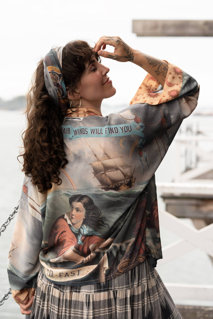Market of Stars Hold Fast kimono styled as a boho travel and adventure layering piece