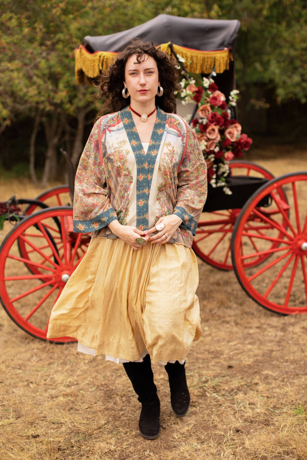 Front view of Market of Stars Love Revolution crop kimono worn open over an outfit, showing drape and fit — one size fits most, 100% viscose