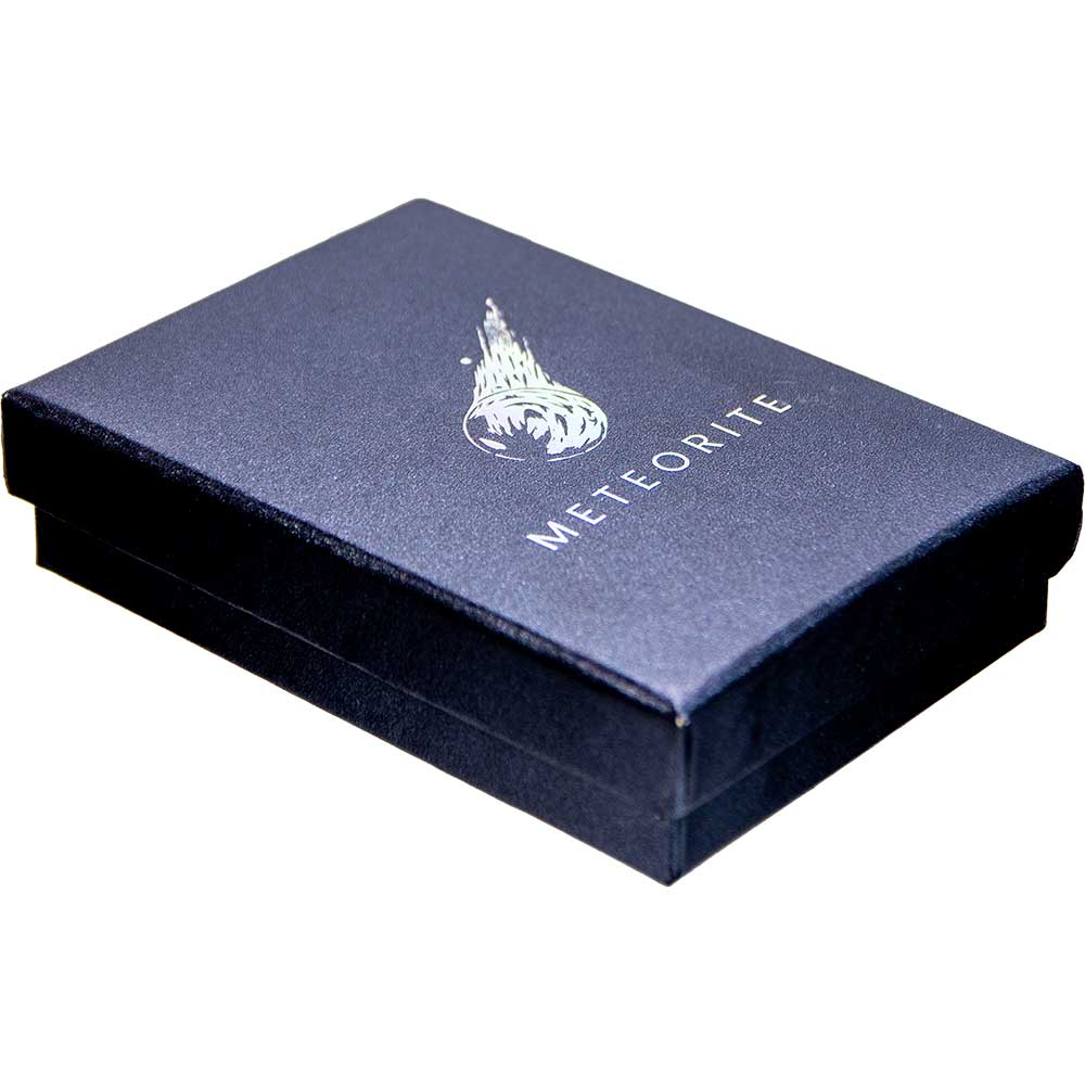 Black meteorite gift box with silver comet logo and meteorite text on lid