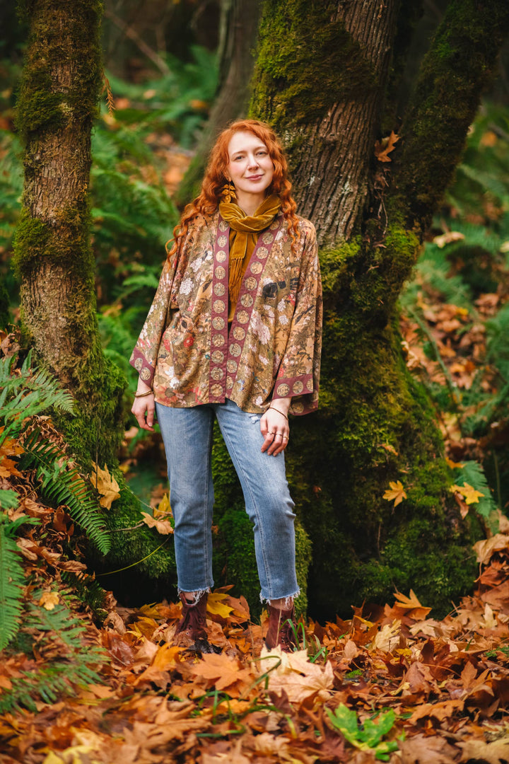Model wearing the Dream Weaver Pixie Duster Mucha Zodiac kimono — one size, length 60cm