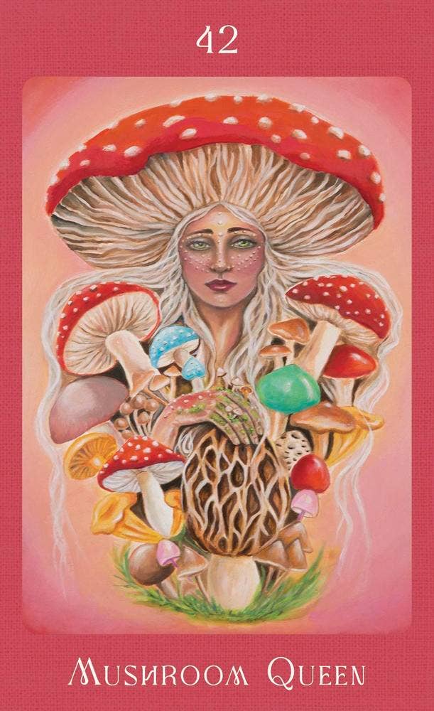 Mushroom Folk Oracle card 42 — Mushroom Queen — a luminous fae queen wearing a red and white Amanita muscaria cap as a hat, surrounded by a colorful array of hand-painted mushroom varieties on a rosy pink background