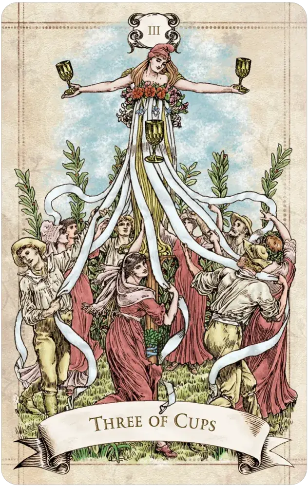 Old Style Tarot — Three of Cups card featuring a flower-crowned goddess atop a Maypole holding three golden chalices aloft while villagers in red robes dance with ribbons below