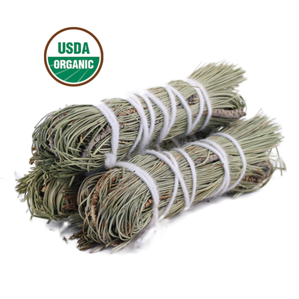 Pine smudge sticks tied with white string and stacked on a white background, with a USDA Organic logo in the upper left.