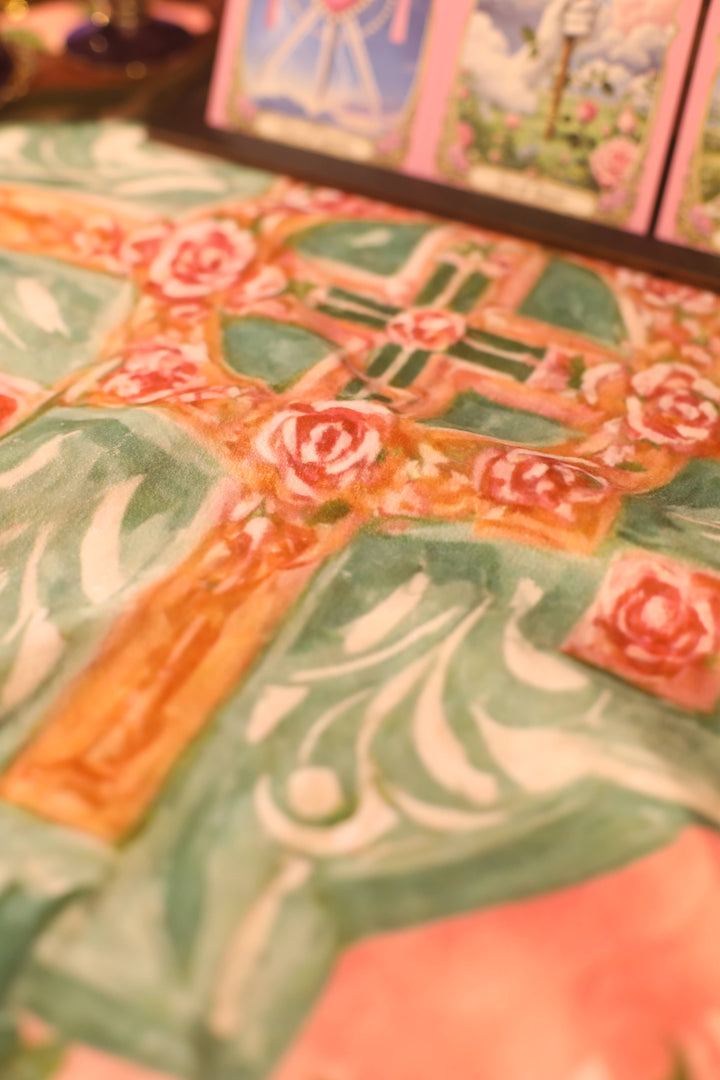 Close-up detail of Renaissance Fantasy Tarot Cloth Rose Cross showing ornate gold and sage green cross with rose embellishments and acanthus leaf scrollwork