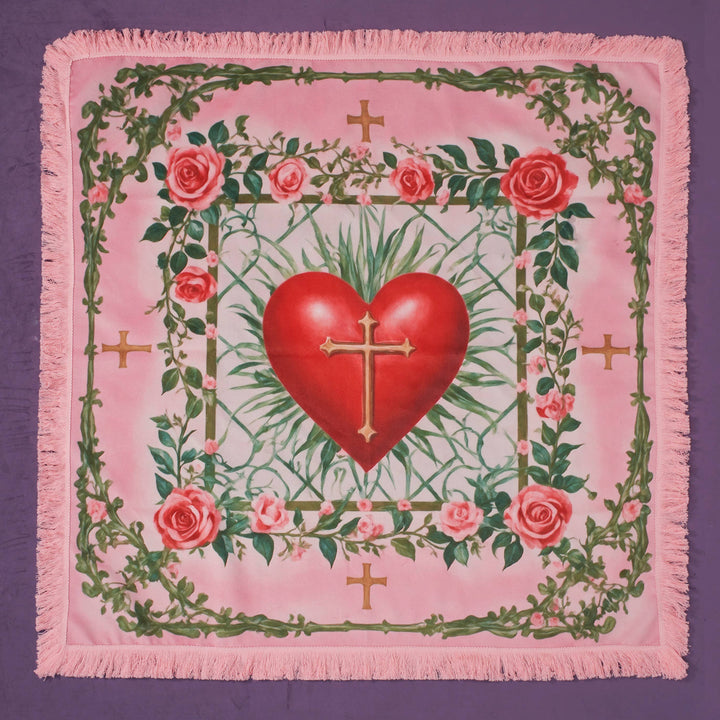 Renaissance Fantasy Tarot Cloth Sacred Heart full view on purple background showing red sacred heart with gold cross center, pink rose vine border, gold cross corner accents, and blush pink tassel fringe