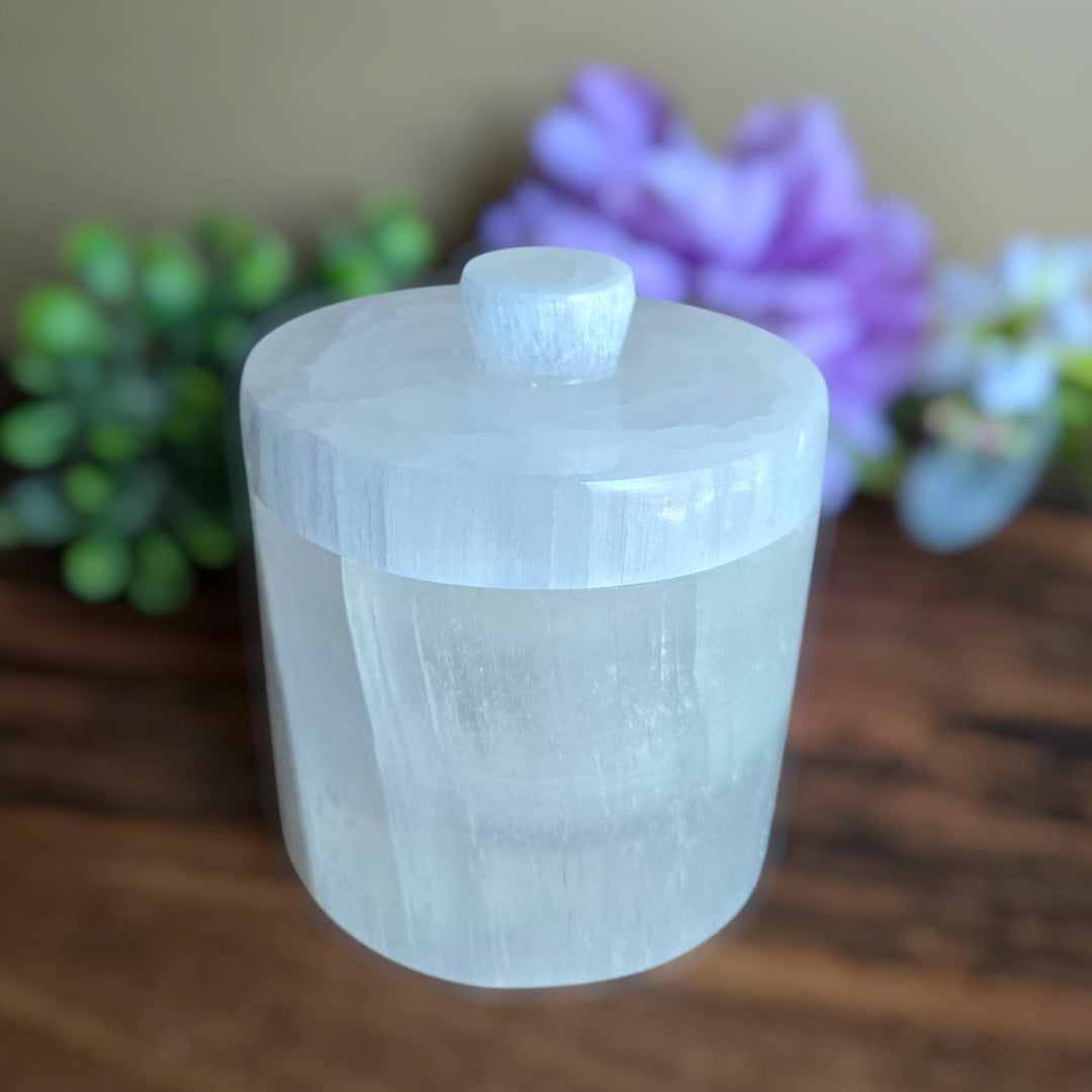 Hand-carved selenite charging jar with fitted lid for crystal cleansing and jewelry energy clearing