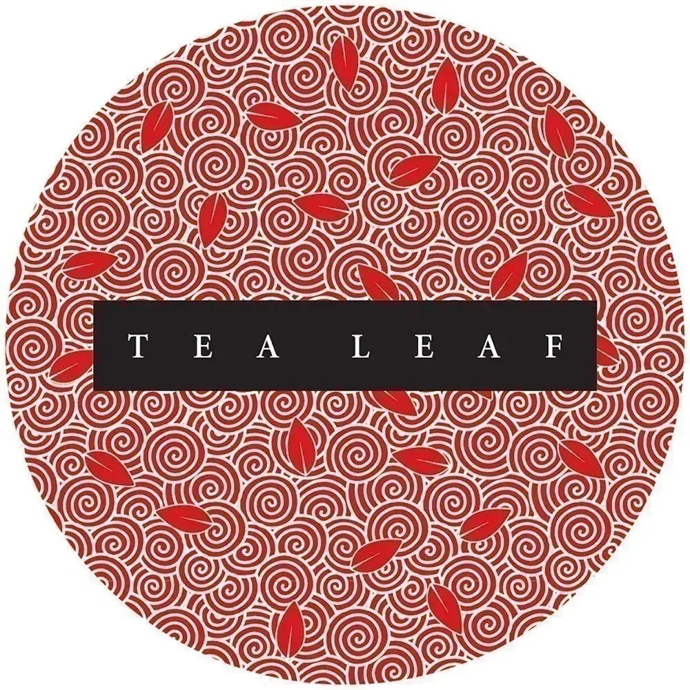 Tea Leaf Fortune Cards round card back, featuring red leaves and cream spiral patterns around a black Tea Leaf title panel.