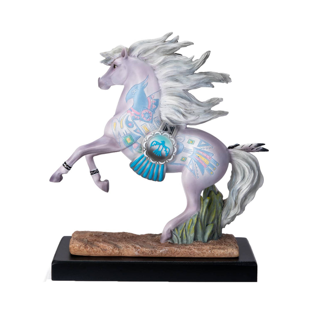 Side view of Thunderbird Native American horse figurine by Laurie Prindle showing white horse profile and Thunderbird design detail