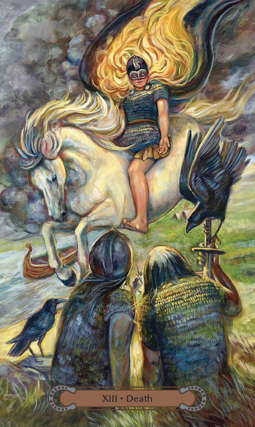 Death tarot card (XIII) from Unbridled Spirit Tarot — masked figure riding a white horse with ravens and kneeling figures below