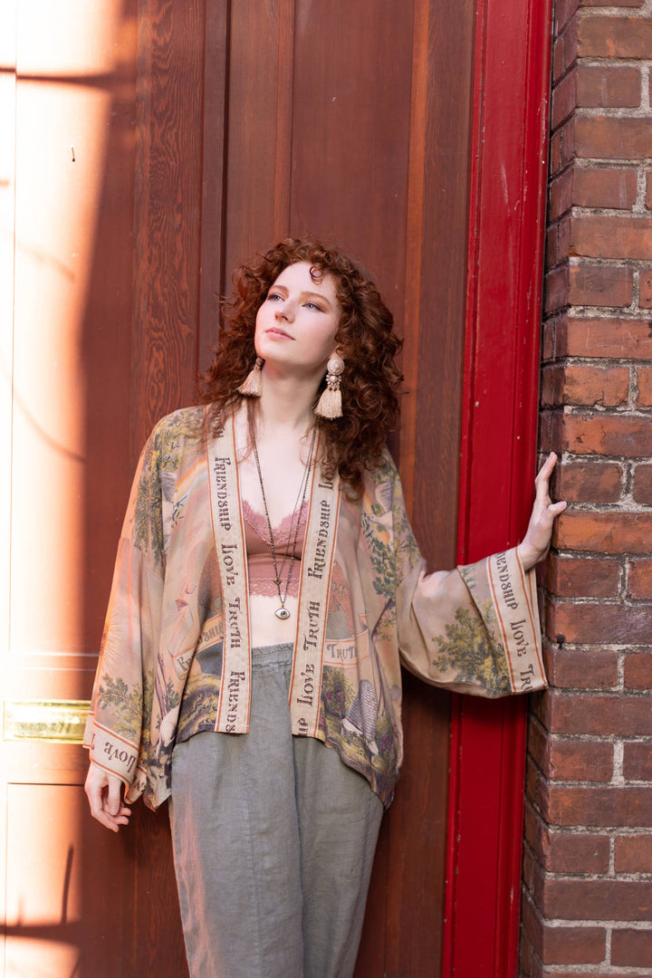 Model wearing Friendship Love and Truth vintage wash boho kimono — one size, length 60cm