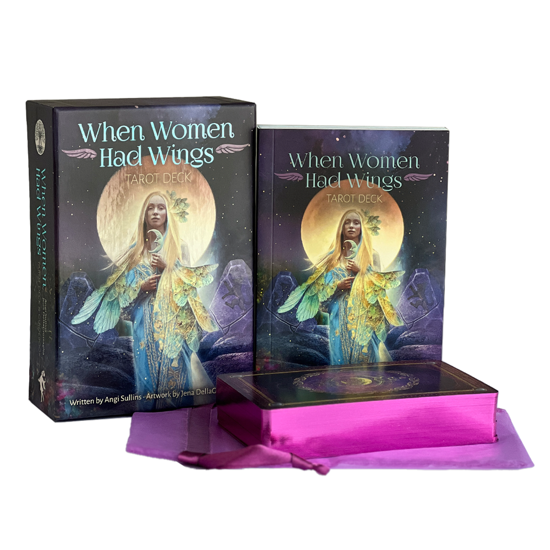 When Women Had Wings Tarot complete set — deck box, 198-page guidebook, and magenta organza drawstring pouch on white background
