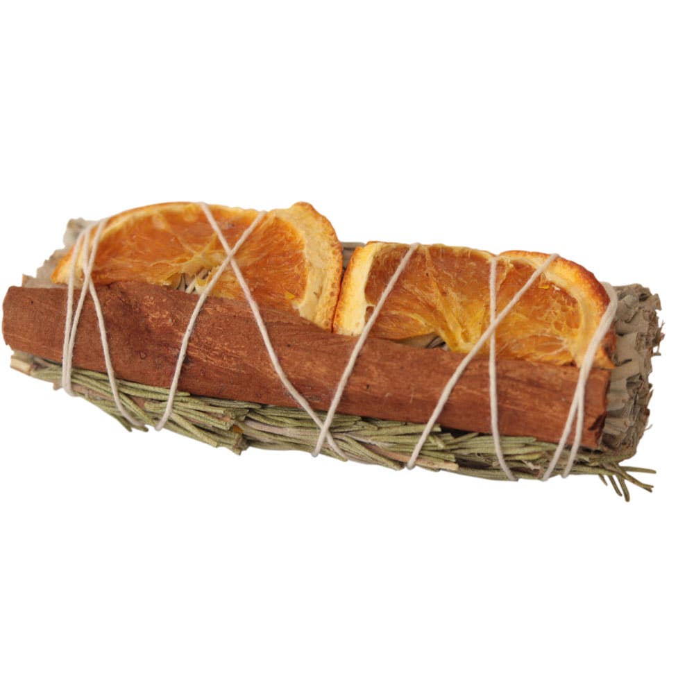 White sage smudge bundle with cedar, cinnamon stick, and dried orange peels for spiritual cleansing