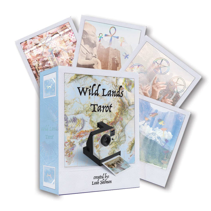 Wild Lands Tarot deck box by Leah Shoman with four holographic Polaroid-style tarot cards fanned out
