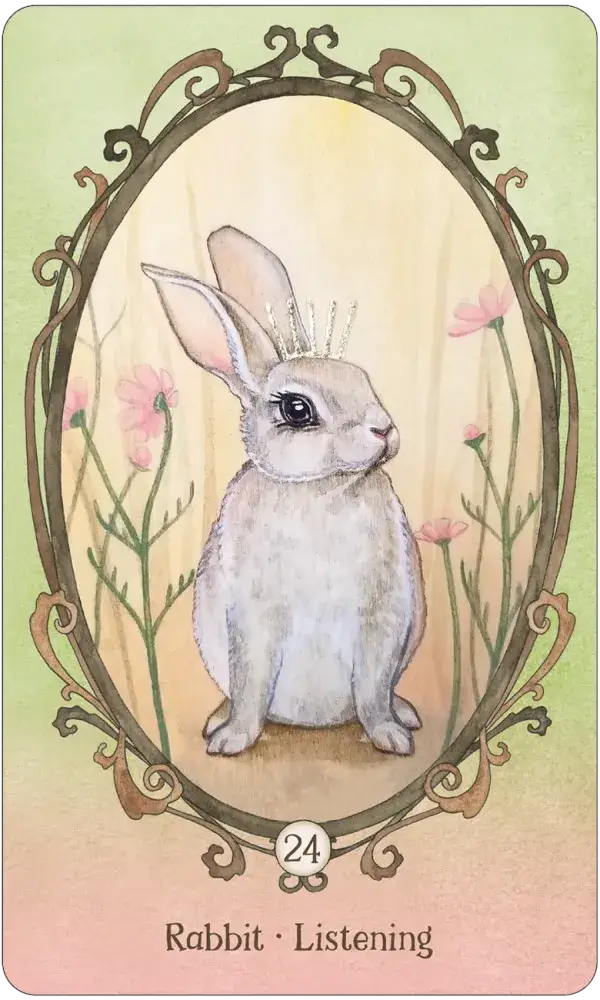 Wing Hoof and Paw Oracle Card 24 — Rabbit · Listening, featuring a grey rabbit with a silver crown seated among pink wildflowers in an ornate oval frame on a soft peach background